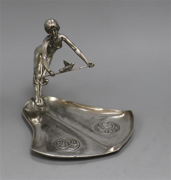 A WMF Art Nouveau figural dish of a girl with a bird height 18cm approx.